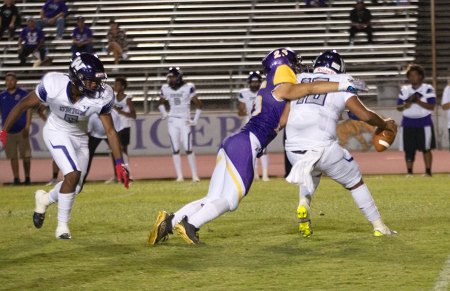 Lemoore's Daniel Rodrigues with a big sack against Washington Union Friday night in Tiger Stadium.